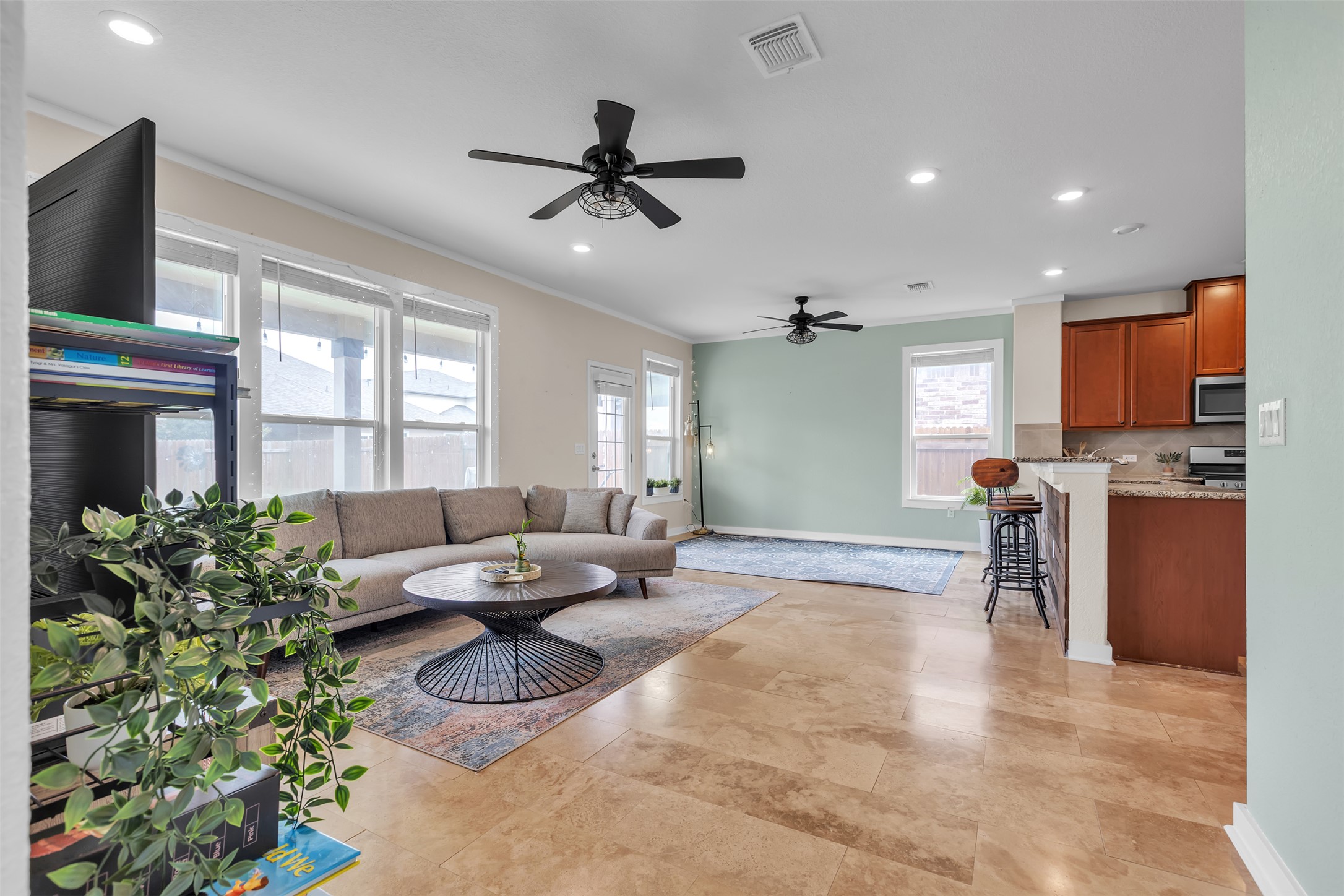 128 Kavanaugh Street Georgetown, TX 78628 - Photo 7 of 13 Open-concept living space featuring light-colored tile flooring