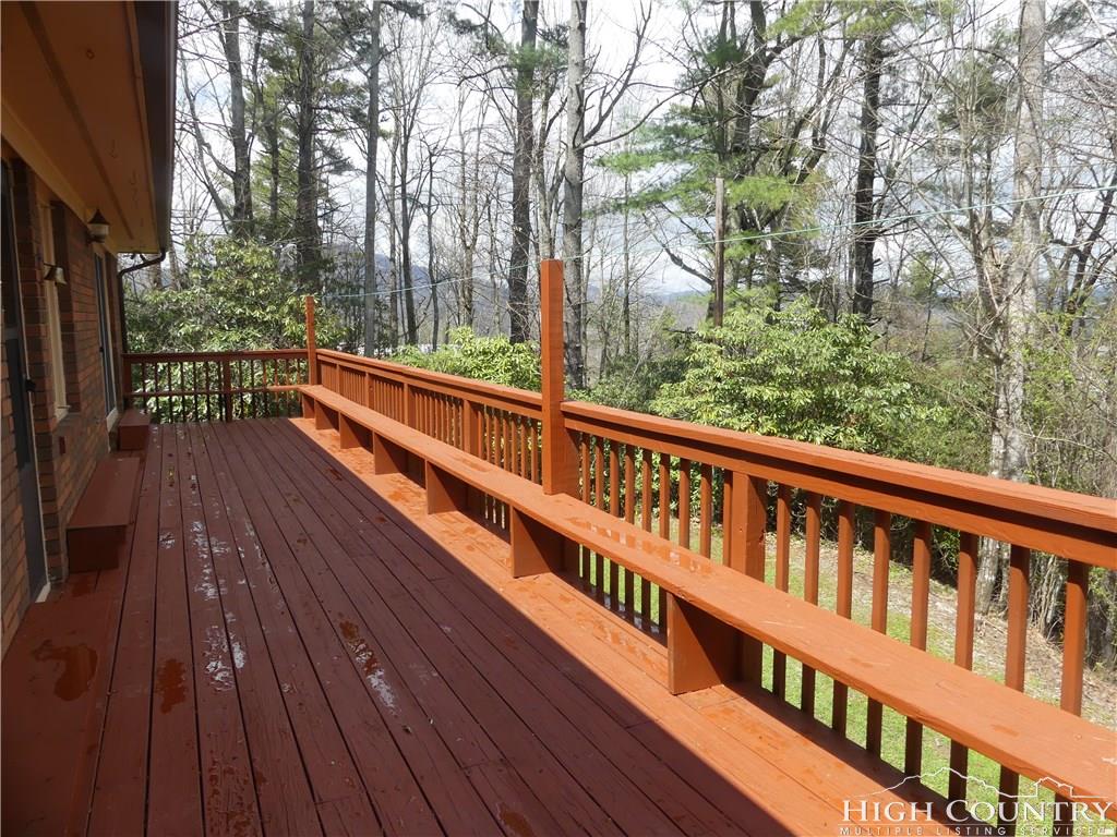567 Deck Hill Road Boone, NC 28607 - Photo 14 of 25 a view of balcony with wooden floor and fence
