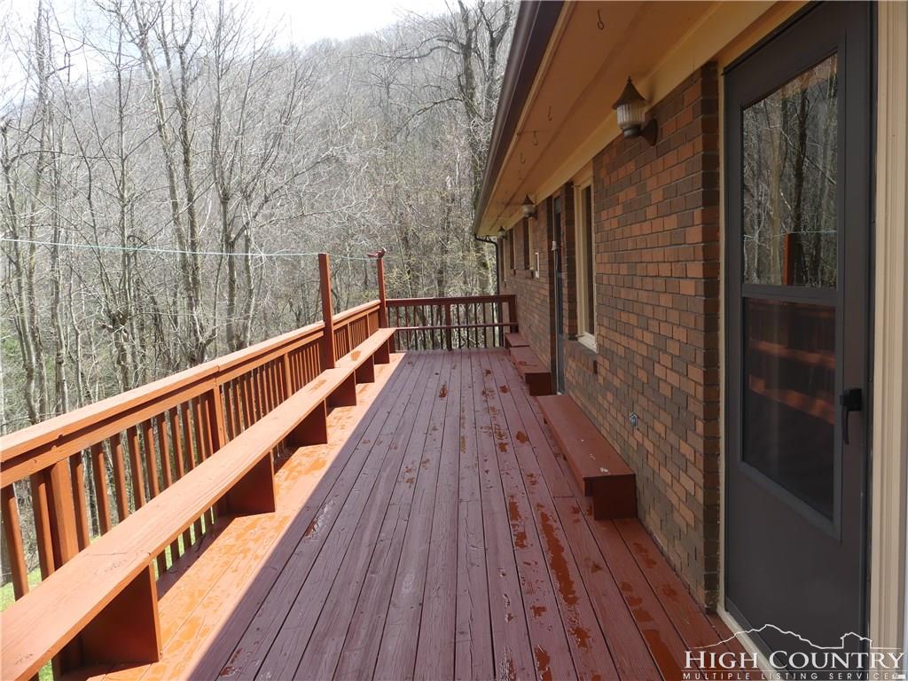 567 Deck Hill Road Boone, NC 28607 - Photo 15 of 25 a balcony with wooden floor