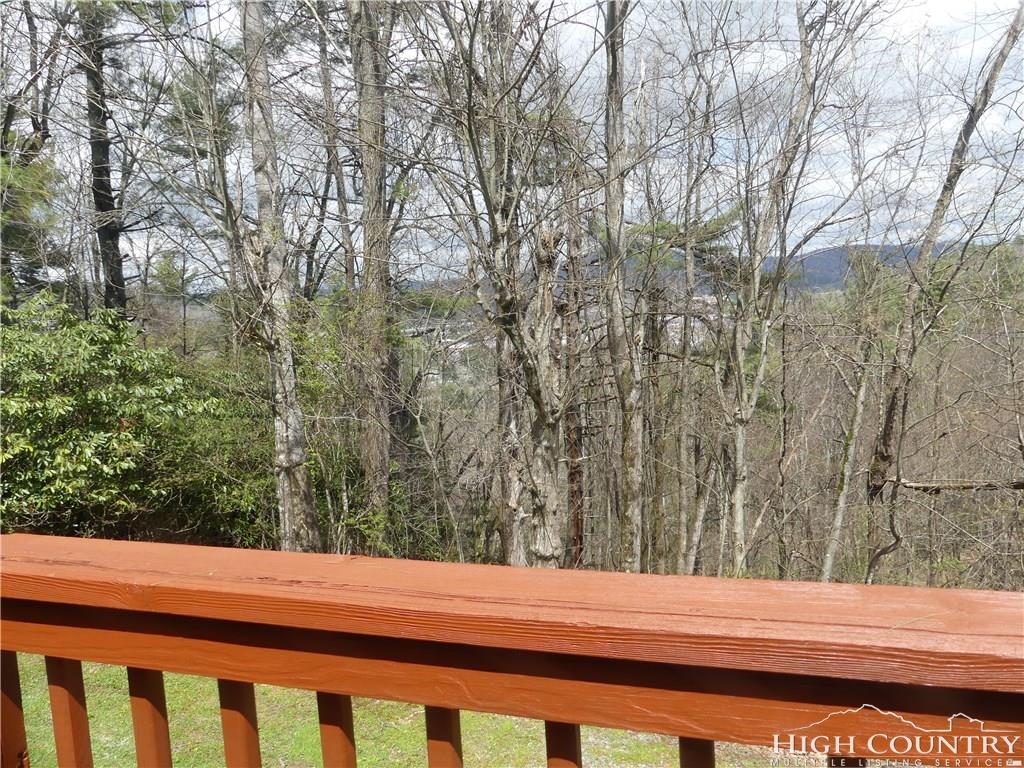 567 Deck Hill Road Boone, NC 28607 - Photo 16 of 25 a view of a yard from a window
