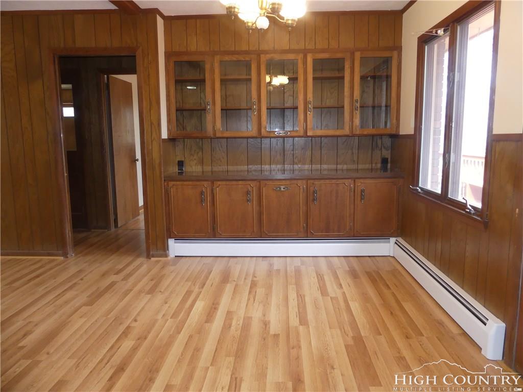 567 Deck Hill Road Boone, NC 28607 - Photo 6 of 25 a view of wooden floor and brick walls