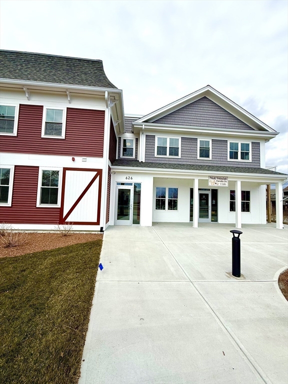 626 Main Street, Unit 111 Dennis, MA 02639 - Photo 16 of 17 a front view of a house with yard
