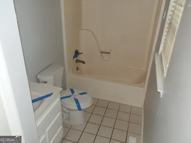 a bathroom with a bathtub