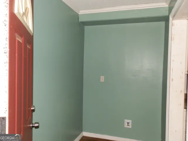 a view of a tree with a yard