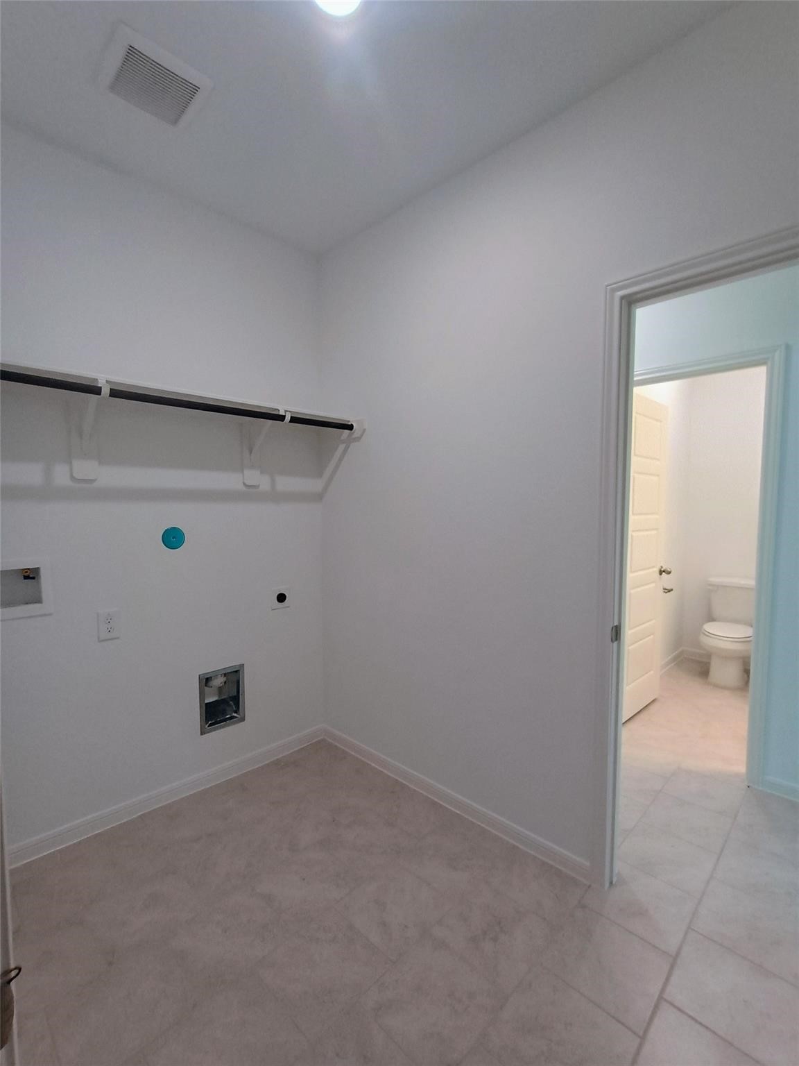15924 Cy Young Court Splendora, TX 77372 - Photo 11 of 29 an empty room and a bathroom