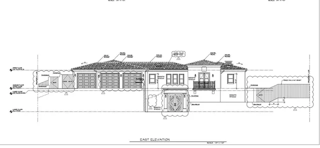 a black and white photo of a living room