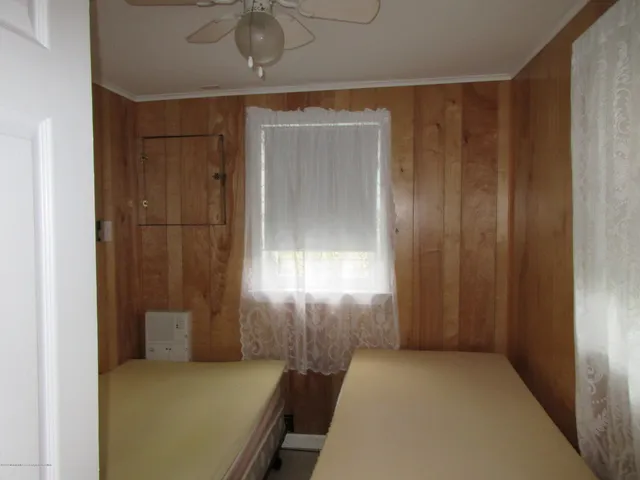 a view of a room with windows