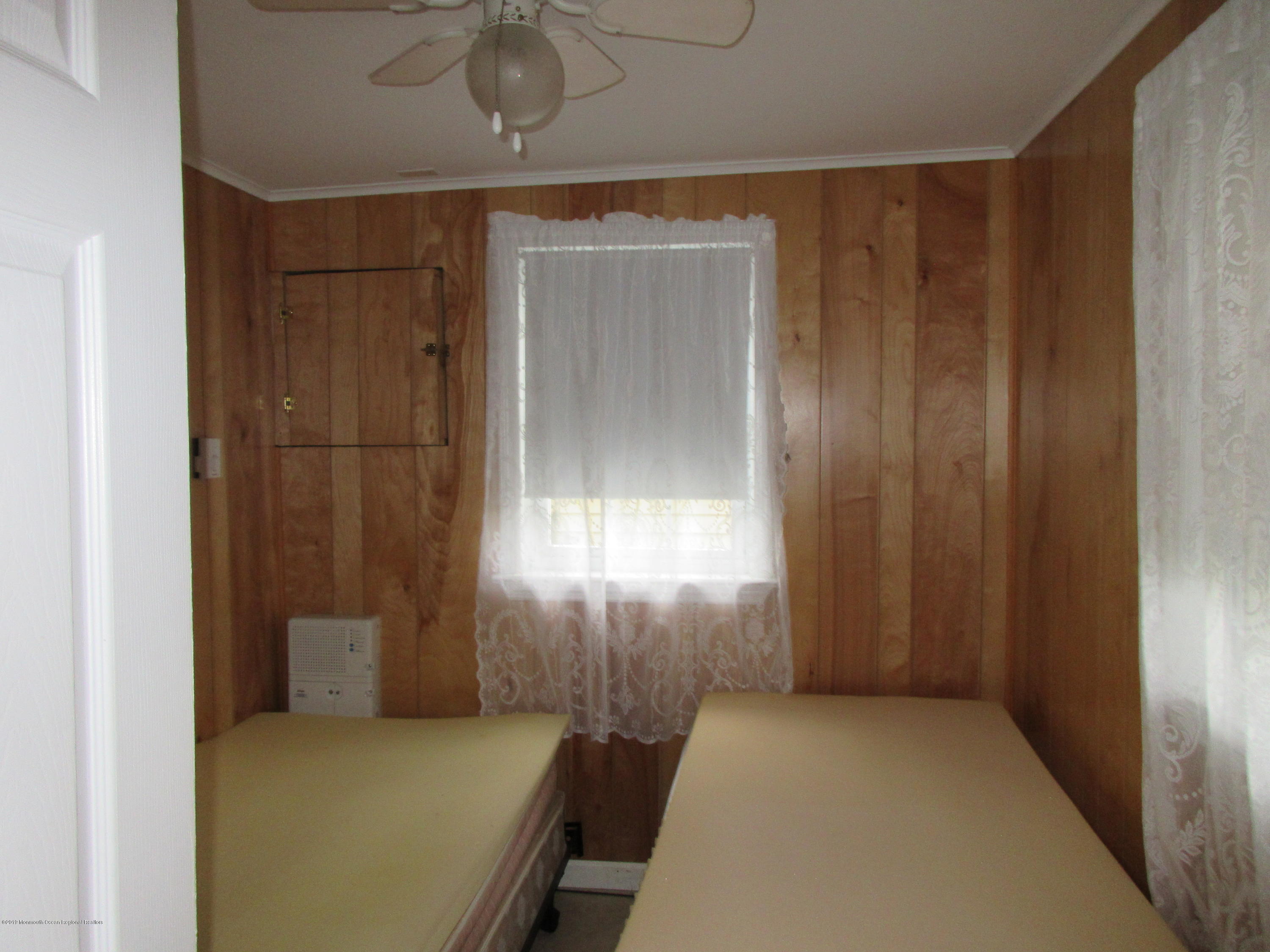 323 15th Avenue, Unit 2 Belmar, NJ 07719 - Photo 4 of 11 a view of a room with windows