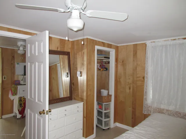 a bathroom with a shower and a sink