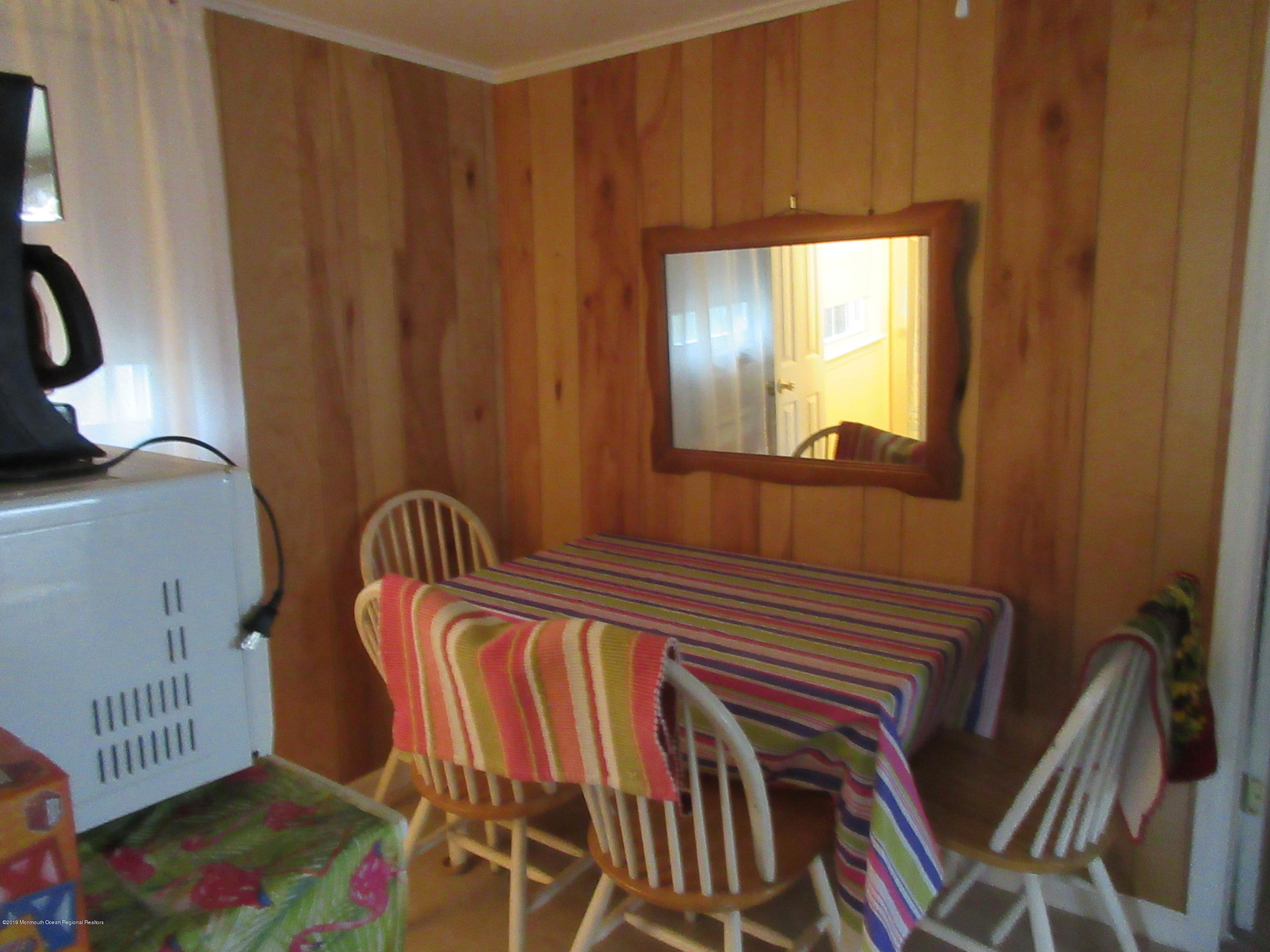323 15th Avenue, Unit 2 Belmar, NJ 07719 - Photo 10 of 11 a view of a balcony with furniture
