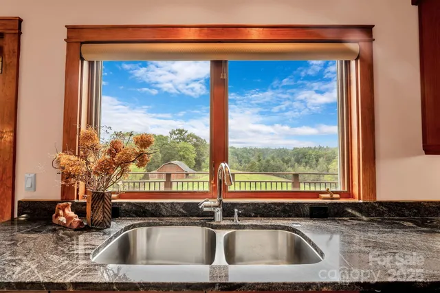 a kitchen sink sitting next to a window