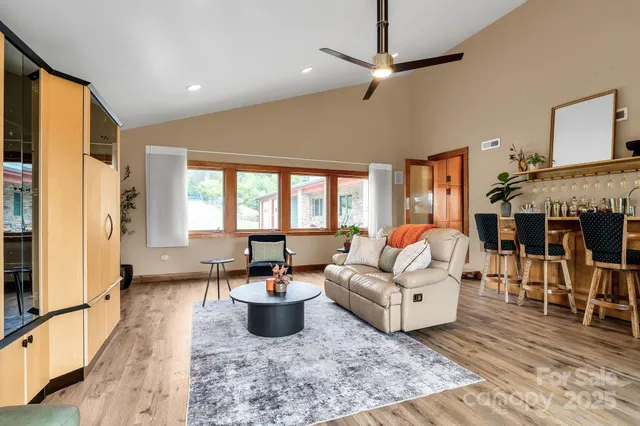 a view of a room that has a table and a chair