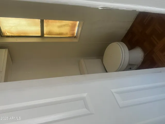 a bathroom with a toilet