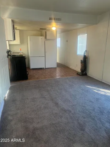 a bathroom with a toilet and a sink