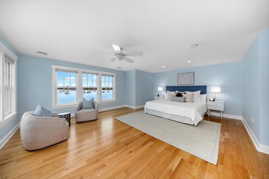 86 Lighthouse Road Scituate, MA 02066 - Photo 11 of 38 a bedroom with furniture and wooden floor