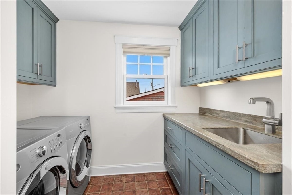 86 Lighthouse Road Scituate, MA 02066 - Photo 18 of 38 a utility room with sink dryer and washer