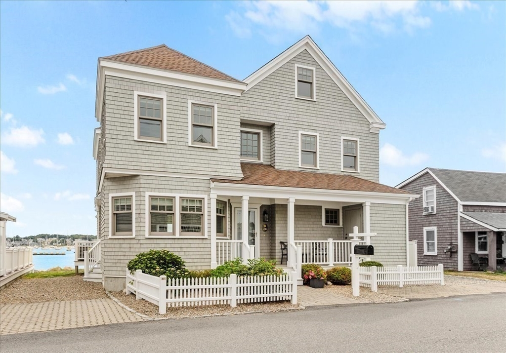 86 Lighthouse Road Scituate, MA 02066 - Photo 24 of 38 a front view of a house with a yard