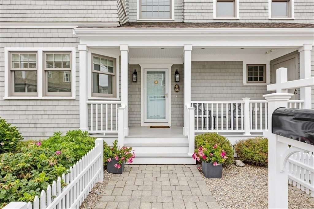 86 Lighthouse Road Scituate, MA 02066 - Photo 25 of 38 a front view of a house with outdoor seating