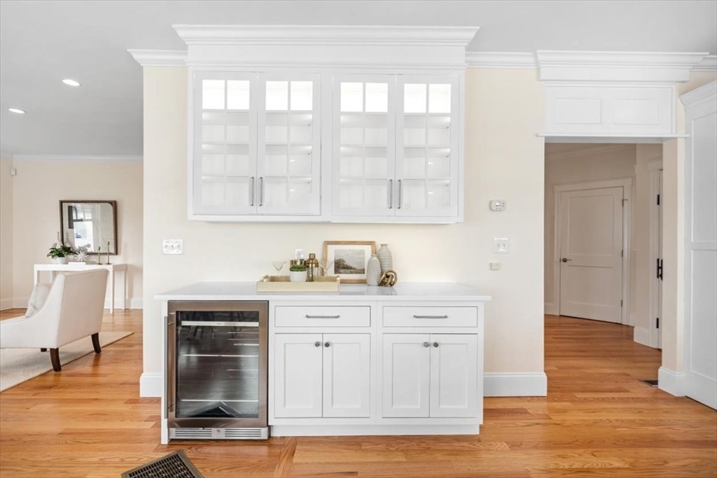 86 Lighthouse Road Scituate, MA 02066 - Photo 7 of 38 a view of cabinets a wooden floor and a kitchen view