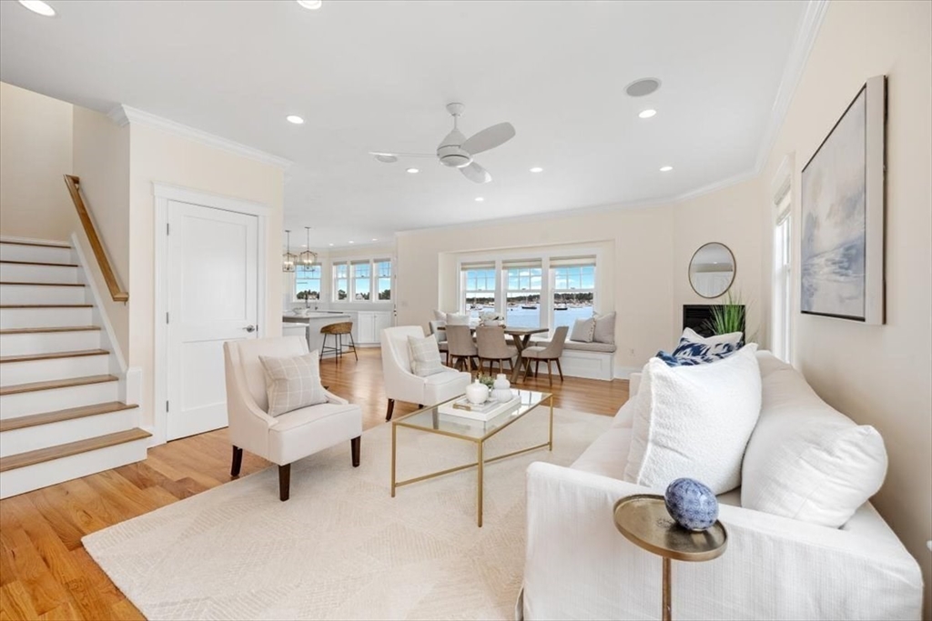 86 Lighthouse Road Scituate, MA 02066 - Photo 8 of 38 a living room with furniture and a wooden floor