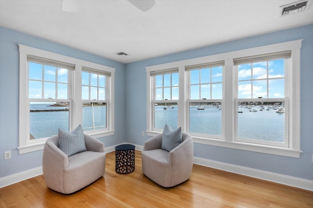 86 Lighthouse Road Scituate, MA 02066 - Photo 10 of 38 a living room with furniture and a window