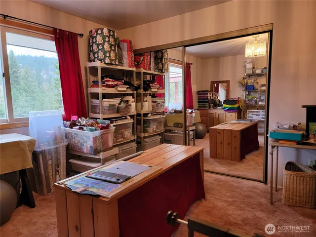 a view of a dining room with furniture window and outside view