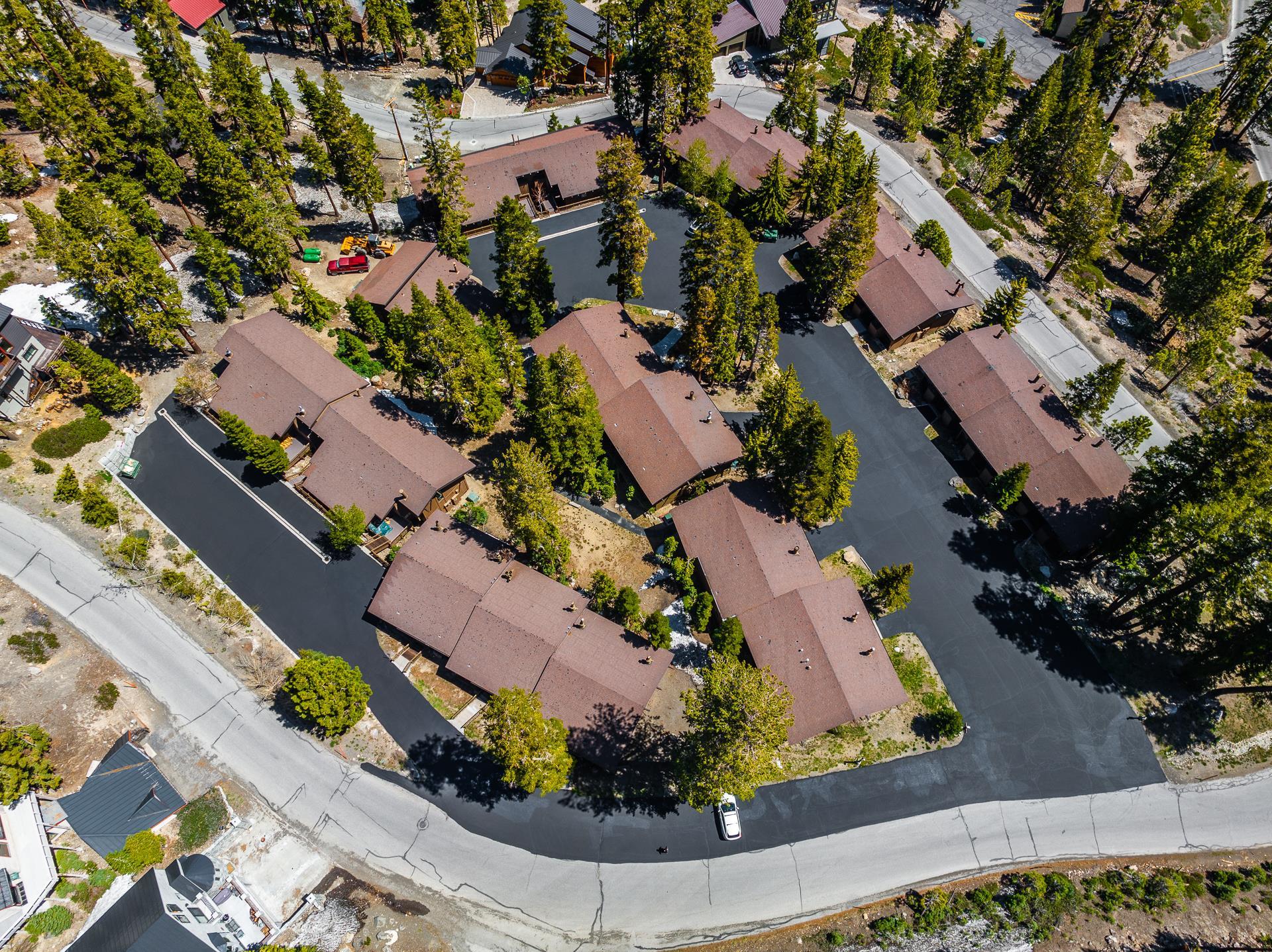 94 John Muir Road, Unit 132 Mammoth Lakes, CA 93546 - Photo 4 of 58 an aerial view of residential houses with outdoor space