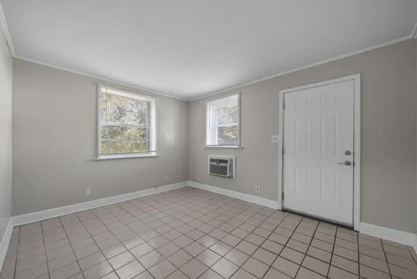 a view of an empty room with window