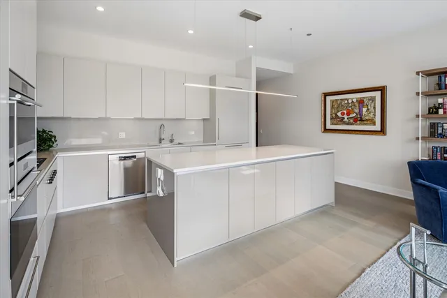a view of a kitchen with electric appliances