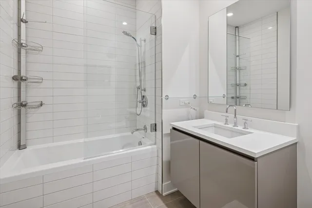 a bathroom with a sink and a bathtub