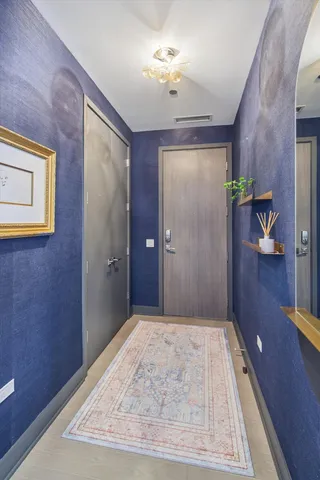 wooden floor in a hall with an entryway