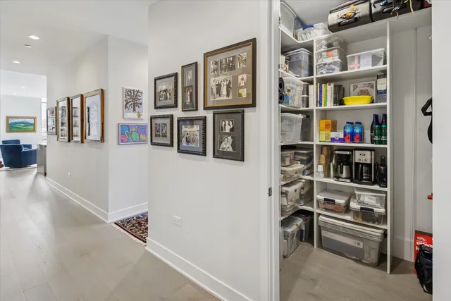 a view of a livingroom with shelves