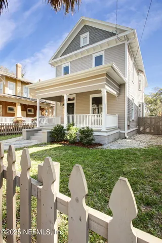 a front view of house with outdoor space and seating