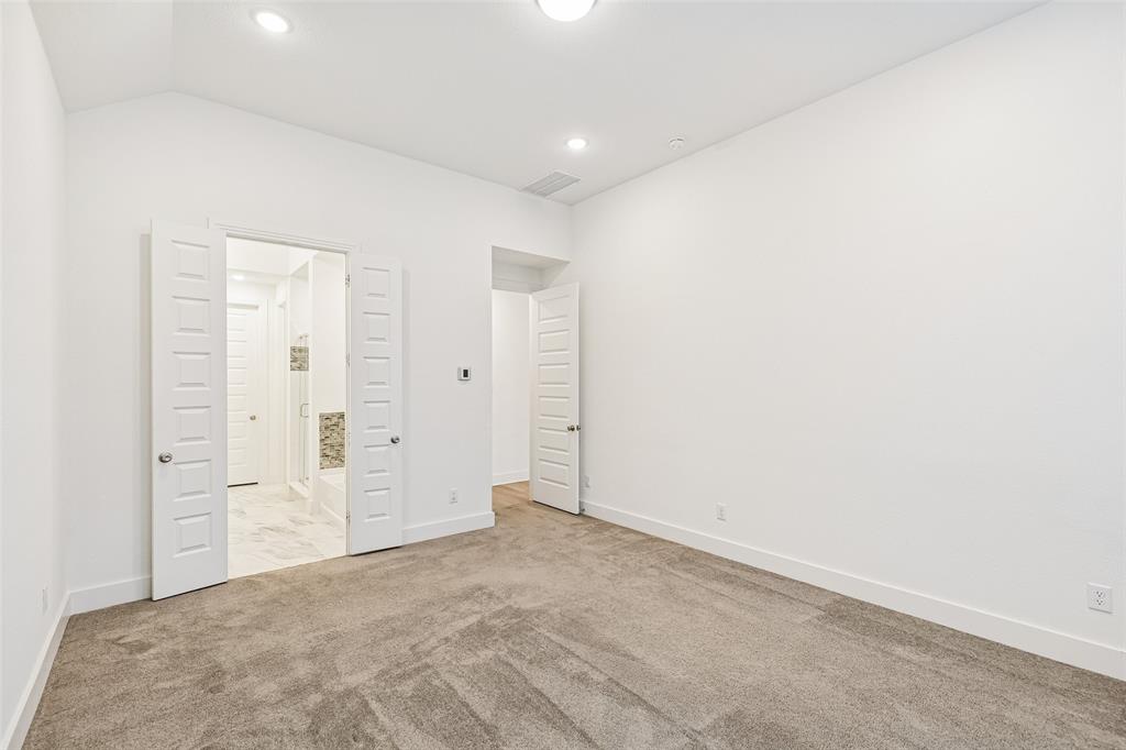 1144 Saddle Ridge Drive Aubrey, TX 76227 - Photo 14 of 34 an empty room with closet area