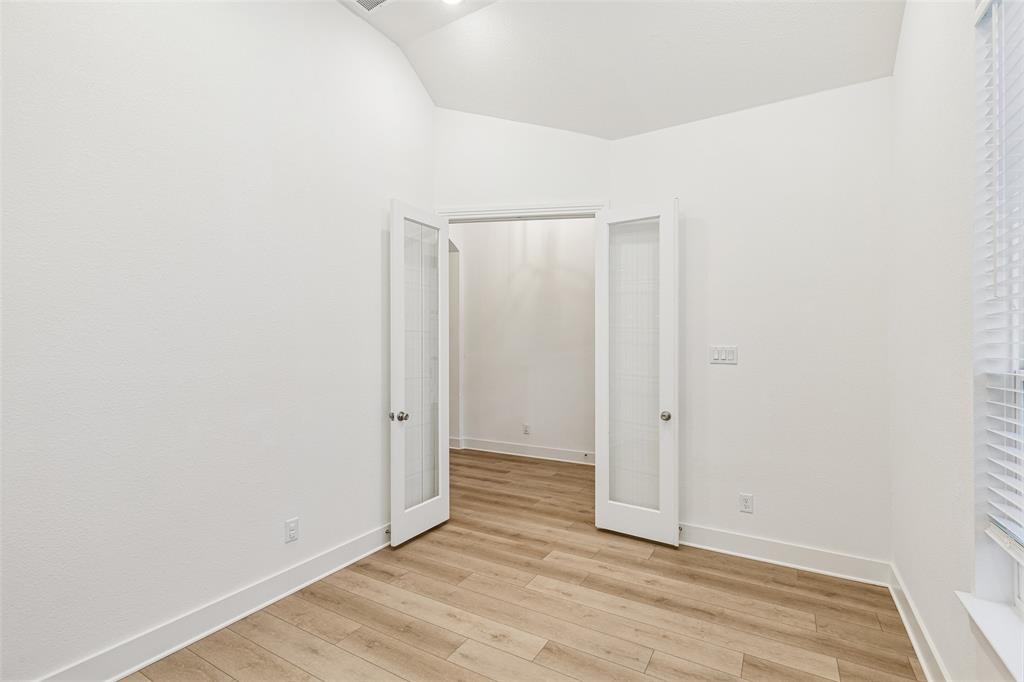 1144 Saddle Ridge Drive Aubrey, TX 76227 - Photo 18 of 34 a view of an empty room