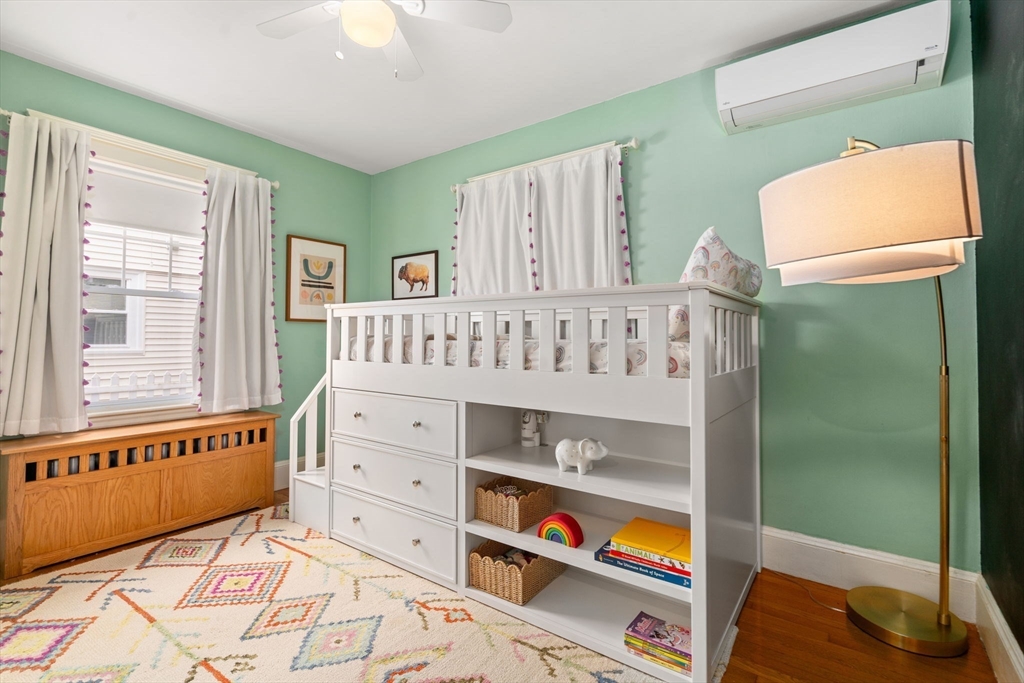 26 Edgebrook Road Boston, MA 02132 - Photo 15 of 30 a bedroom with furniture and a window