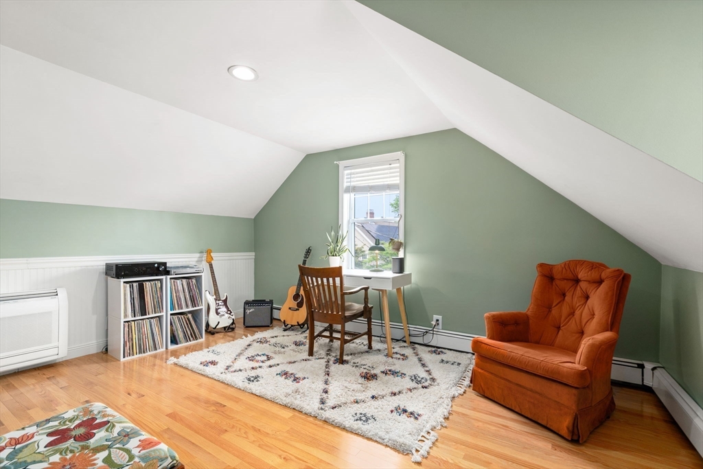 26 Edgebrook Road Boston, MA 02132 - Photo 19 of 30 a living room with furniture rug and a table