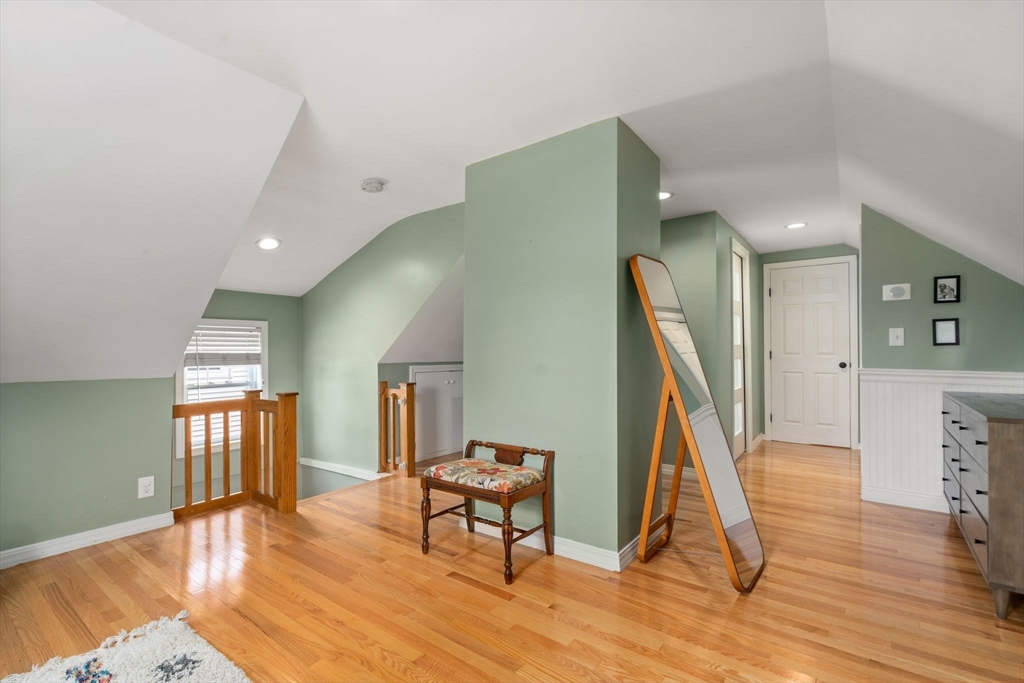 26 Edgebrook Road Boston, MA 02132 - Photo 21 of 30 a view of a livingroom with furniture and a wooden floor