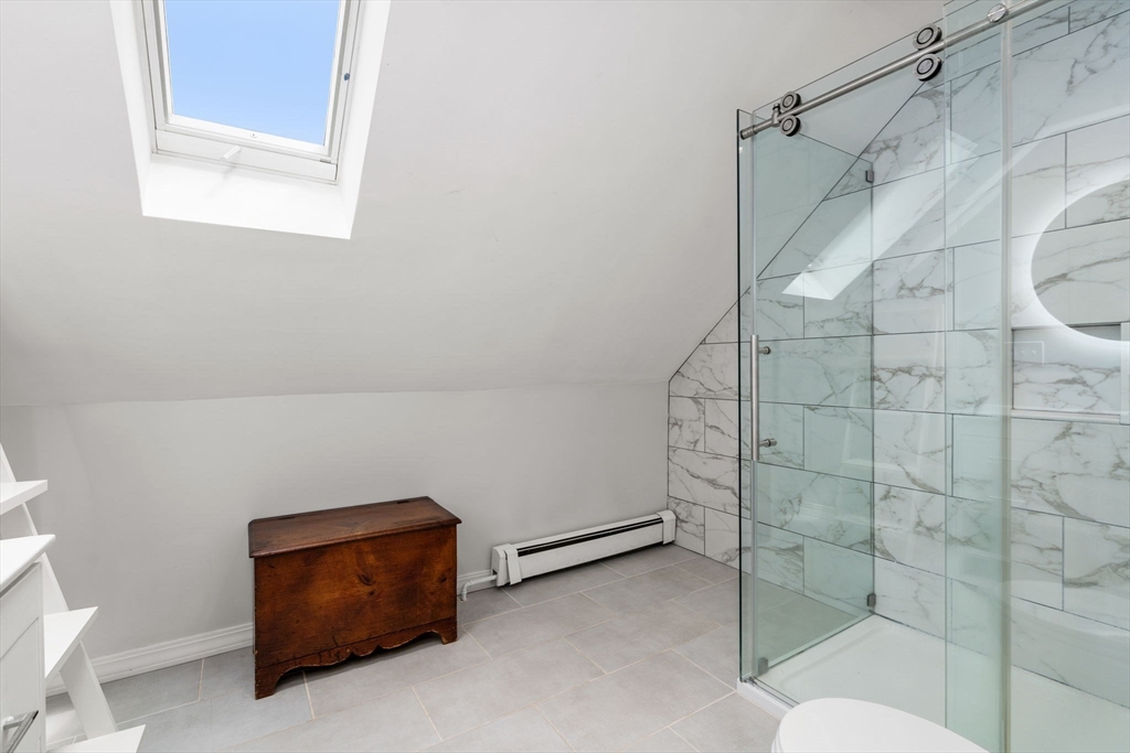 26 Edgebrook Road Boston, MA 02132 - Photo 22 of 30 a bathroom with a shower and a sink