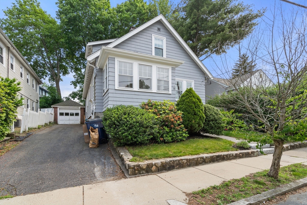26 Edgebrook Road Boston, MA 02132 - Photo 24 of 30 a view of a house with a yard and potted plants