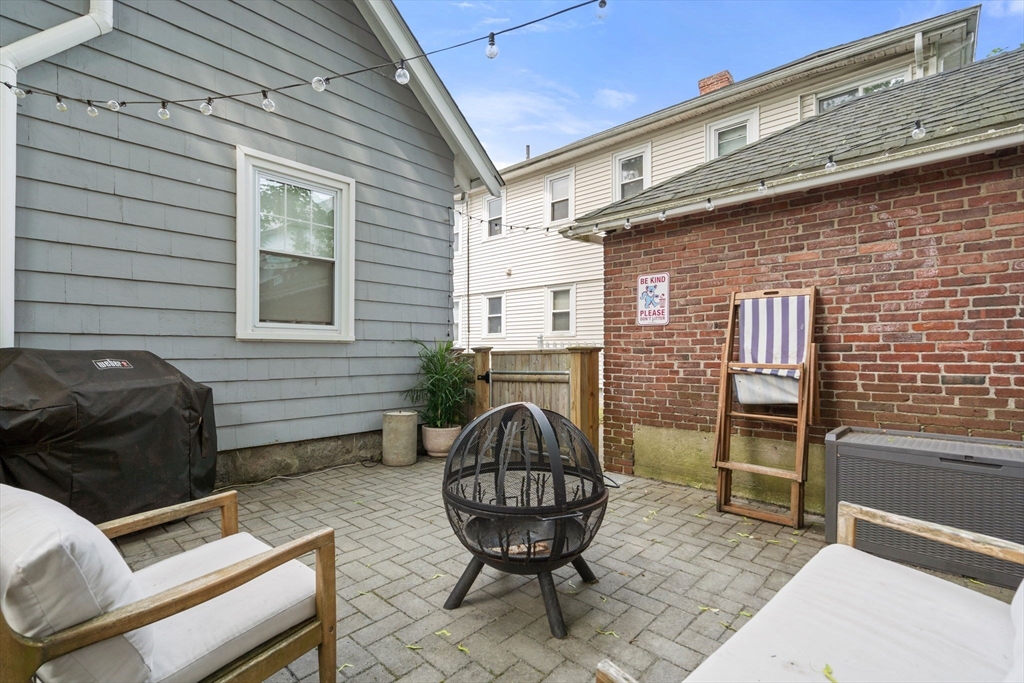 26 Edgebrook Road Boston, MA 02132 - Photo 25 of 30 a front view of a house with backyard