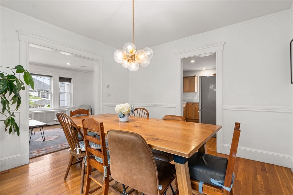 26 Edgebrook Road Boston, MA 02132 - Photo 7 of 30 a view of a dining room with furniture and wooden floor