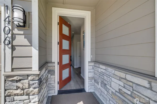 a view of front door and bedroom