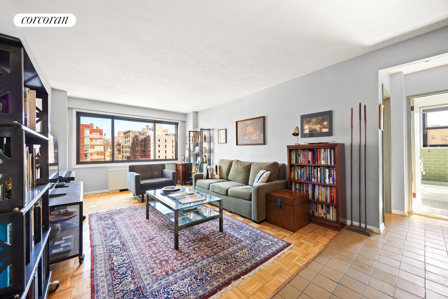 a living room with furniture and a window