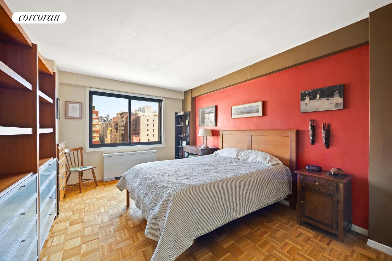 201 West 21st Street, Unit 14F Manhattan, NY 10011 - Photo 5 of 10 a bedroom with a bed and a window