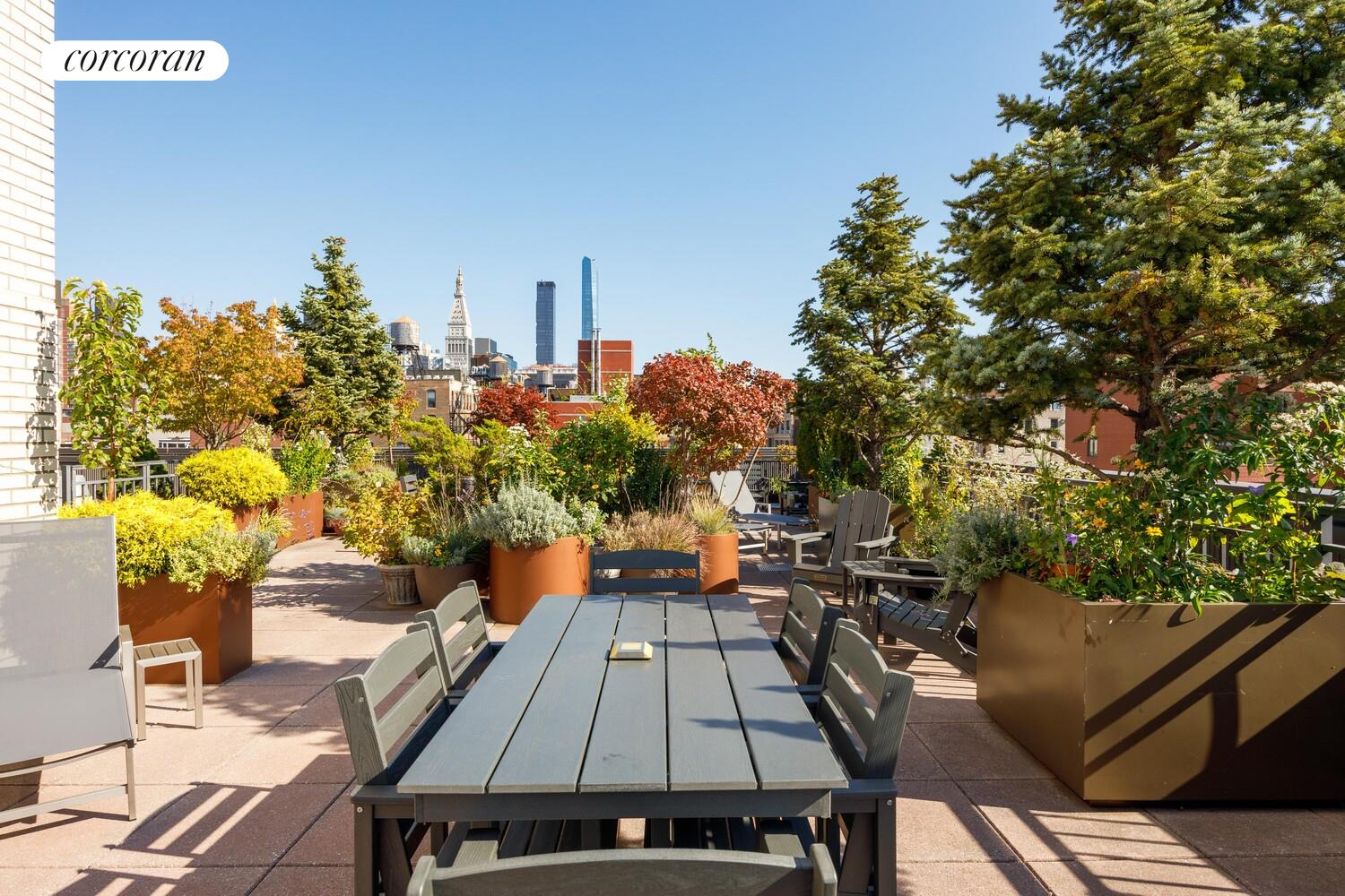 201 West 21st Street, Unit 14F Manhattan, NY 10011 - Photo 8 of 10 a view of a terrace with furniture and a potted plant