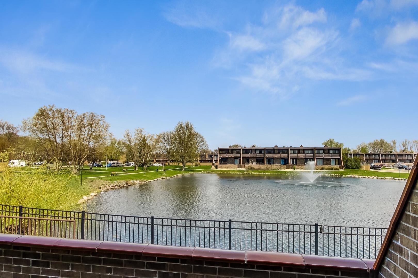 102 Kenneth Circle Elgin, IL 60120 - Photo 9 of 33 a view of a swimming pool and lake view