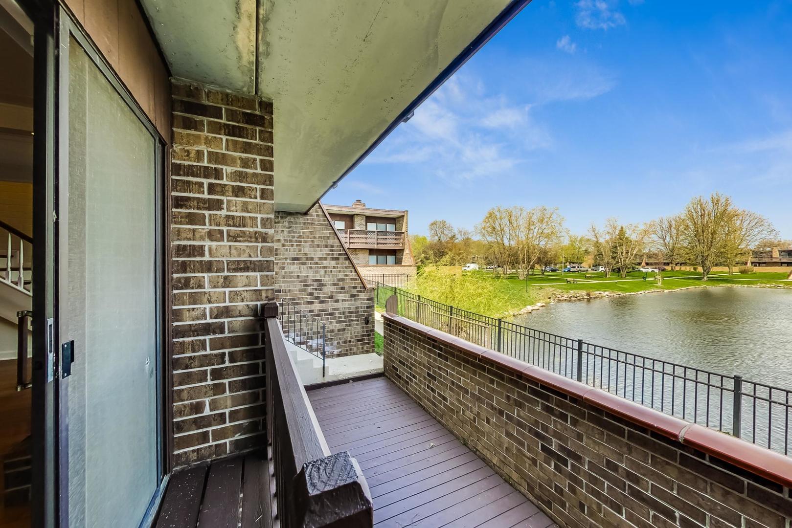 102 Kenneth Circle Elgin, IL 60120 - Photo 10 of 33 a view of balcony with city