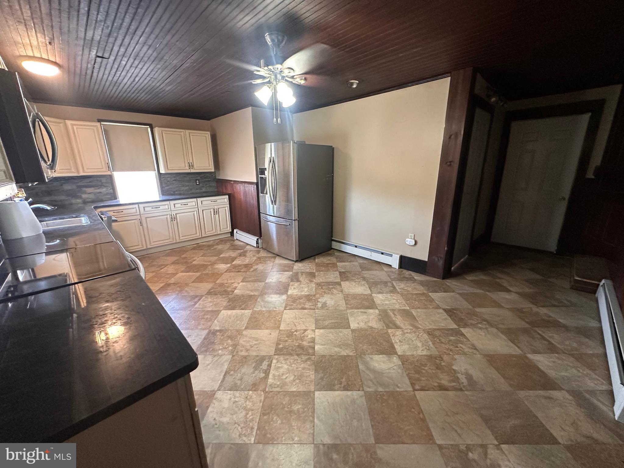 92 Deysher Road Fleetwood, PA 19522 - Photo 5 of 12 a view of a hallway with wooden floor