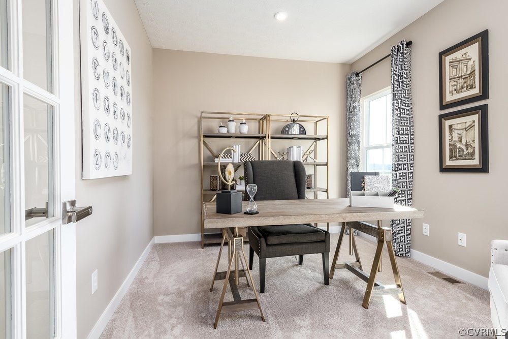 621 Marsham Road Chester, VA 23836 - Photo 8 of 16 a workspace with furniture and window